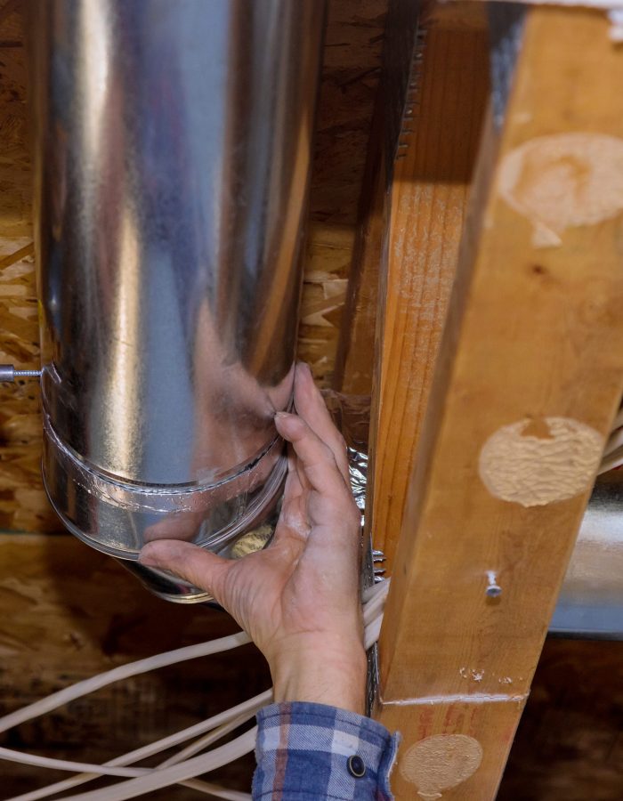 Air hvac system installation under inside ceiling before interior finishing of central conditioning